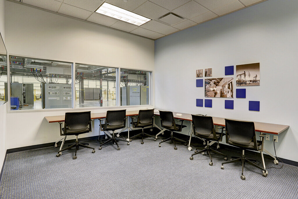 Collaborative workspace in Emerson Network Power office in Houston, TX, with modern furnishings