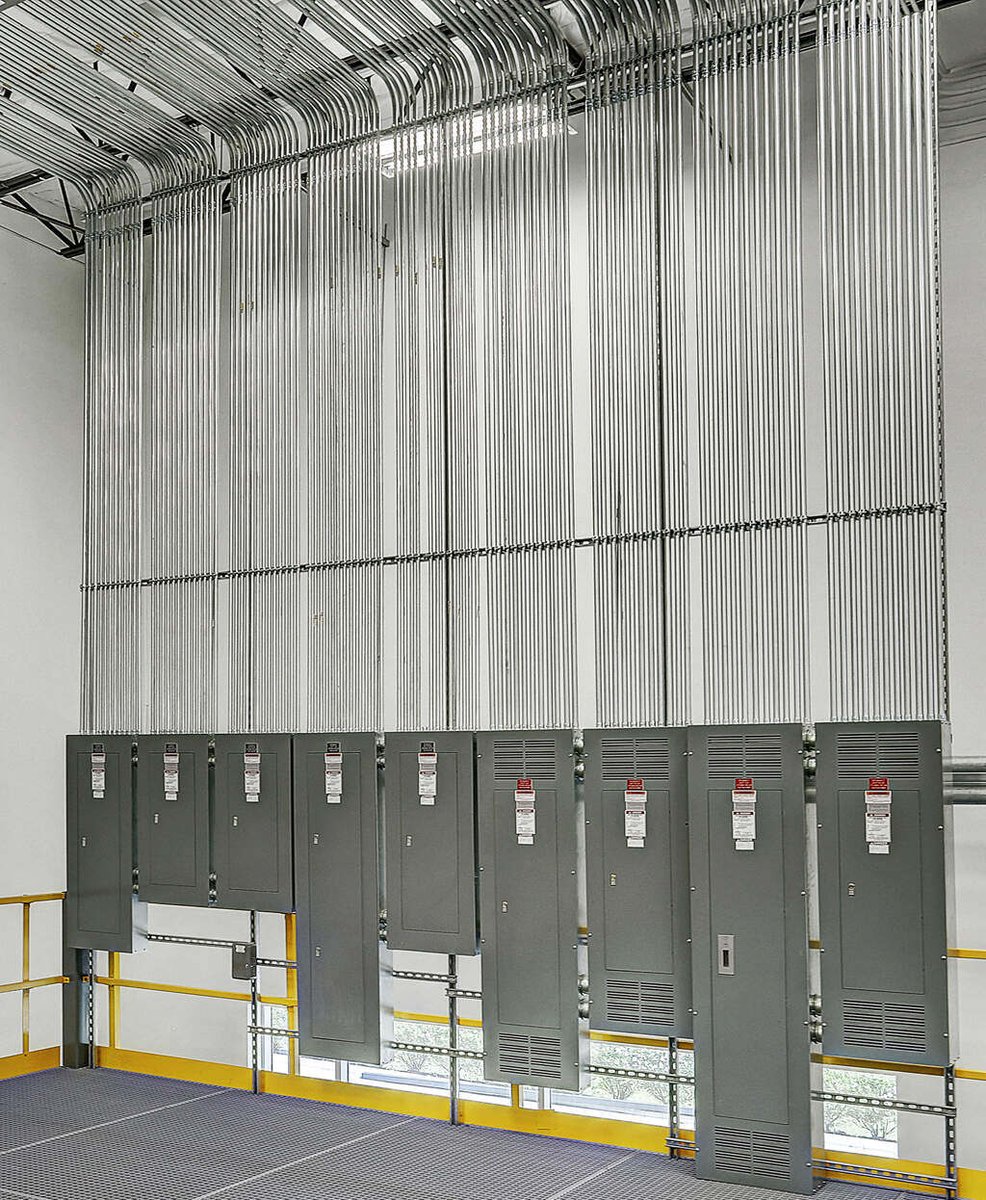 Updated breakroom space in Emerson Network Power office in Houston, TX, with seating and appliances