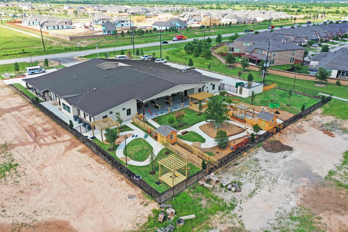Aerial view highlighting the extensive landscaping and renovated facilities of the commercial project by GSD Construction in Houston, TX