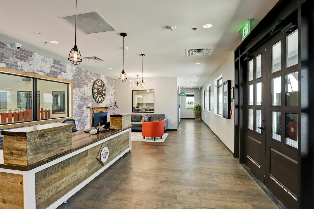 Contemporary exterior with brown doors and black metal accents, renovated by GSD Construction in Houston, TX