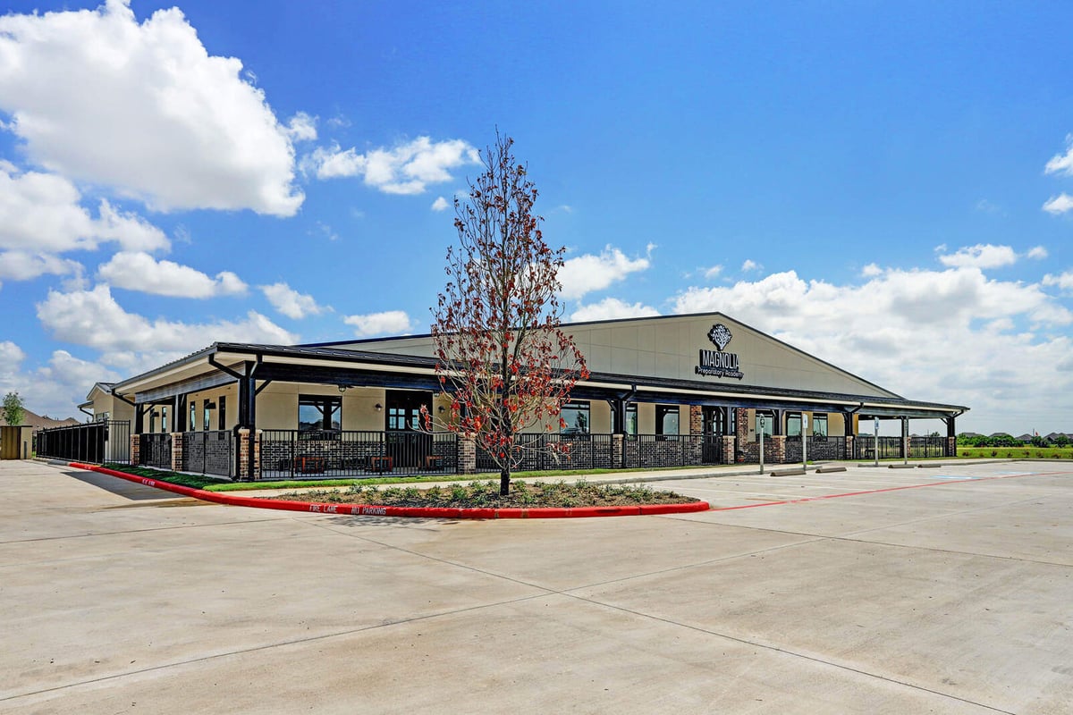 Parking area and entrance of a renovated commercial property by GSD Construction in Houston, TX
